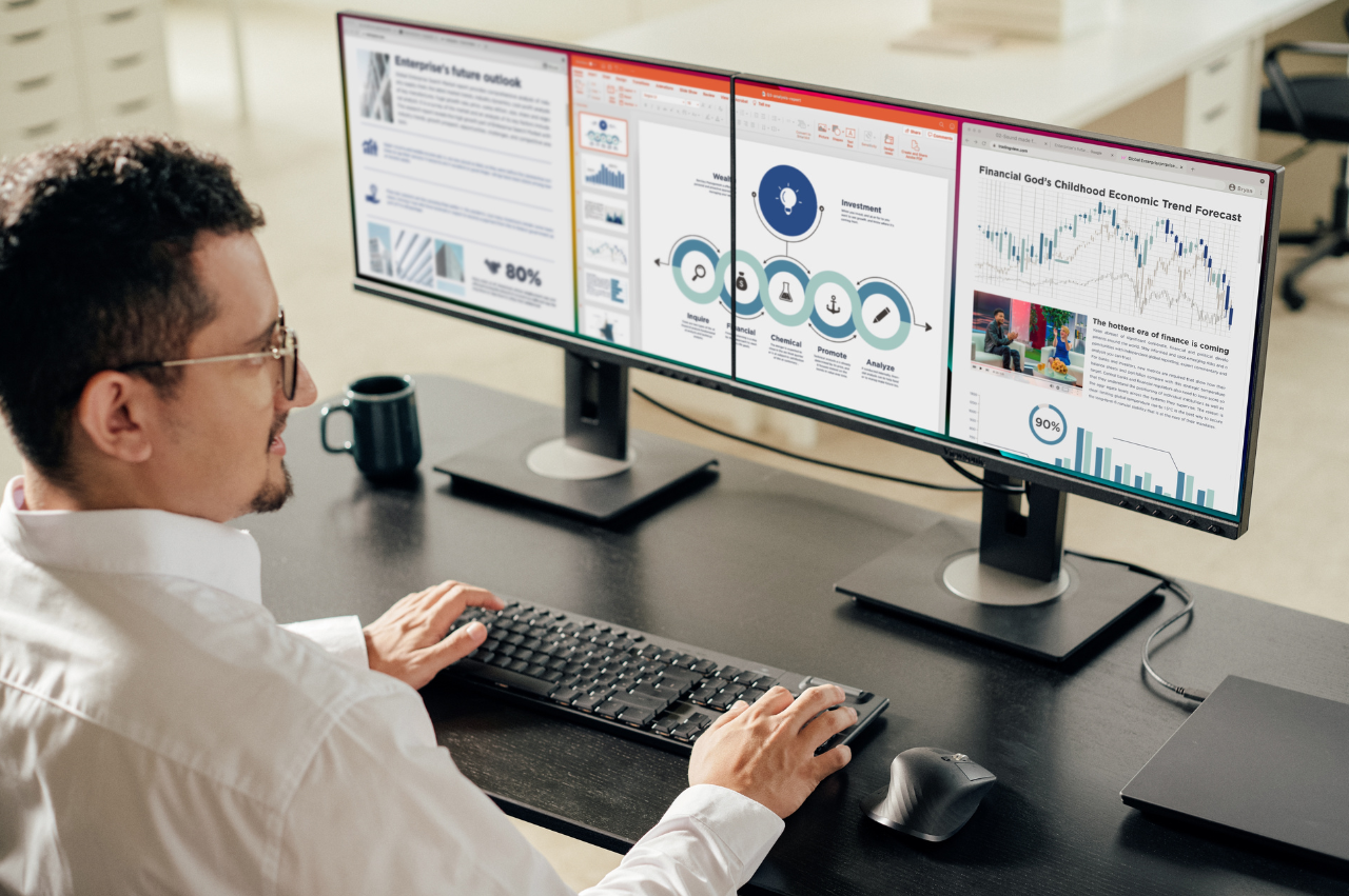 Man using dual monitors side by side {{brizy_dc_image_alt imageSrc=